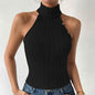 Black Stylish 3Sixty5 tight ribbed knit top for women, close-up of fitted, textured knit fabric and long sleeves.