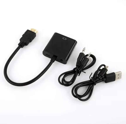 Techplus HDMI to VGA converter adapter with audio and USB ports, showing the compact black device connected to cables.