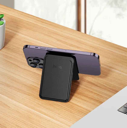 Techplus Hoco leather magnetic multifunctional card holder with sleek design and multiple card slots, black color, compact accessory.