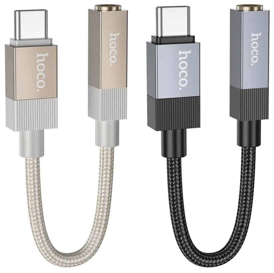 Techplus UPA32C Type C to 3.5mm audio adapter showing the compact black adapter and connector ports.