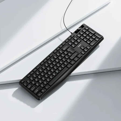 Techplus USB wired full-size keyboard with black keys and standard layout, featuring a numeric keypad and multimedia keys.