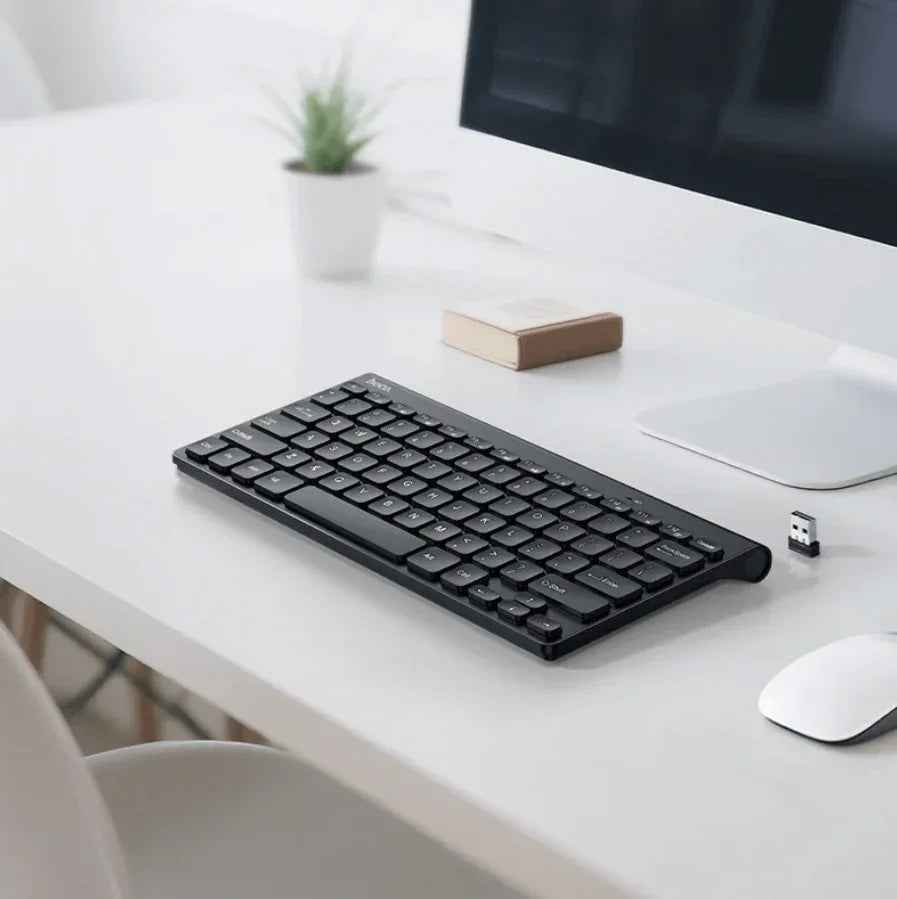 Wireless mini keyboard from TechPlus with USB nano receiver, compact design ideal for portable use and easy connectivity.