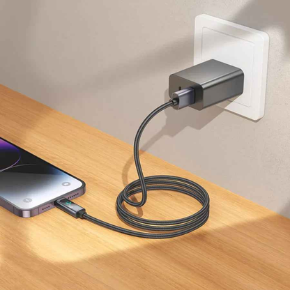 Techplus X112 USB to iPhone fast charging cable with 2.4A power and LED display, showcasing the cable connected to an iPhone.