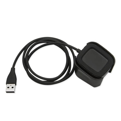 Black Fitbit Versa 1 charger from That Watch Shop with magnetic charging connector and compact design.