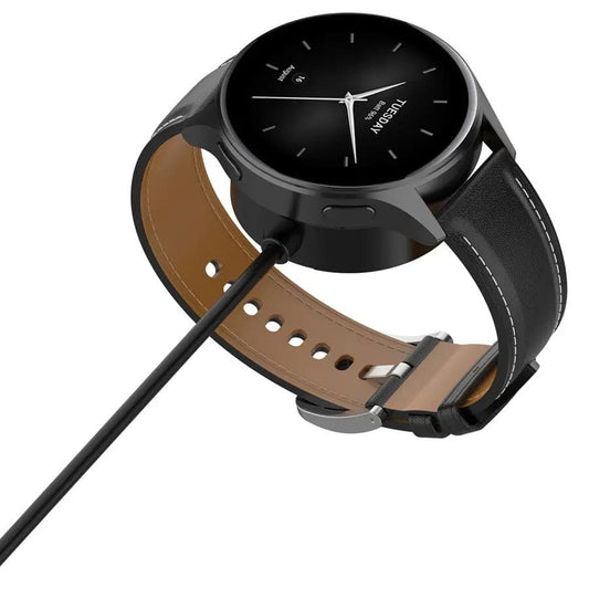 Black Xiaomi watch charger compatible with S4, S3, S2, and Mi Watch 2 Pro, shown connected to a smartwatch.
