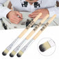 Three-piece watch cleaning brush set from That Watch Shop, featuring watch tools for gentle and effective cleaning of timepieces.