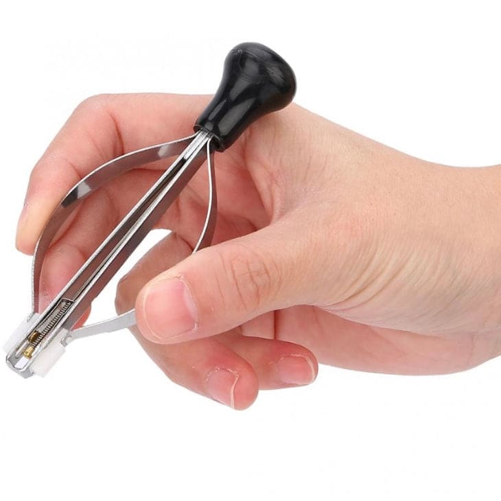 Watch hand removal and fitment tool by That Watch Shop, precise tool for watch repair and hand adjustments.