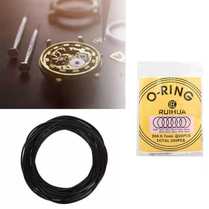 Close-up of 0.7mm watch O-rings for waterproof watches, part of watch tools by That Watch Shop, showing the small rubber rings.