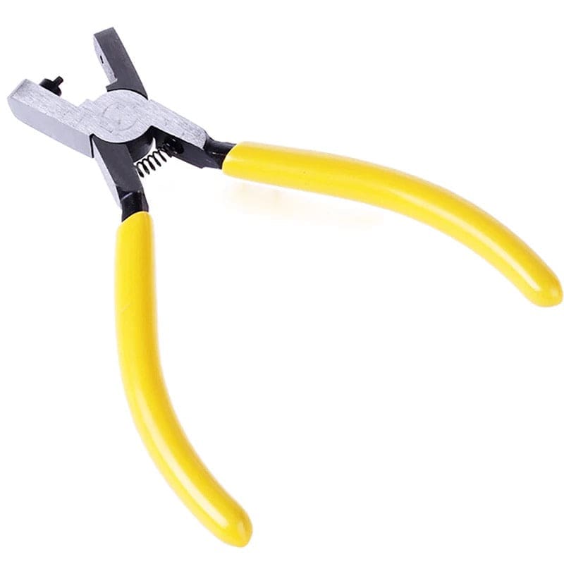Leather hole punch for watch straps and belts, by That Watch Shop, featuring durable steel construction and ergonomic handle.