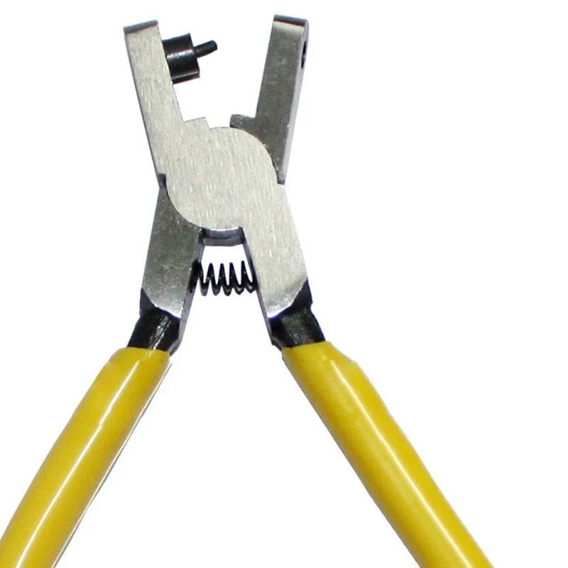 Leather hole punch tool for watch straps and belts from That Watch Shop, featuring a durable metal punching head and ergonomic handle.