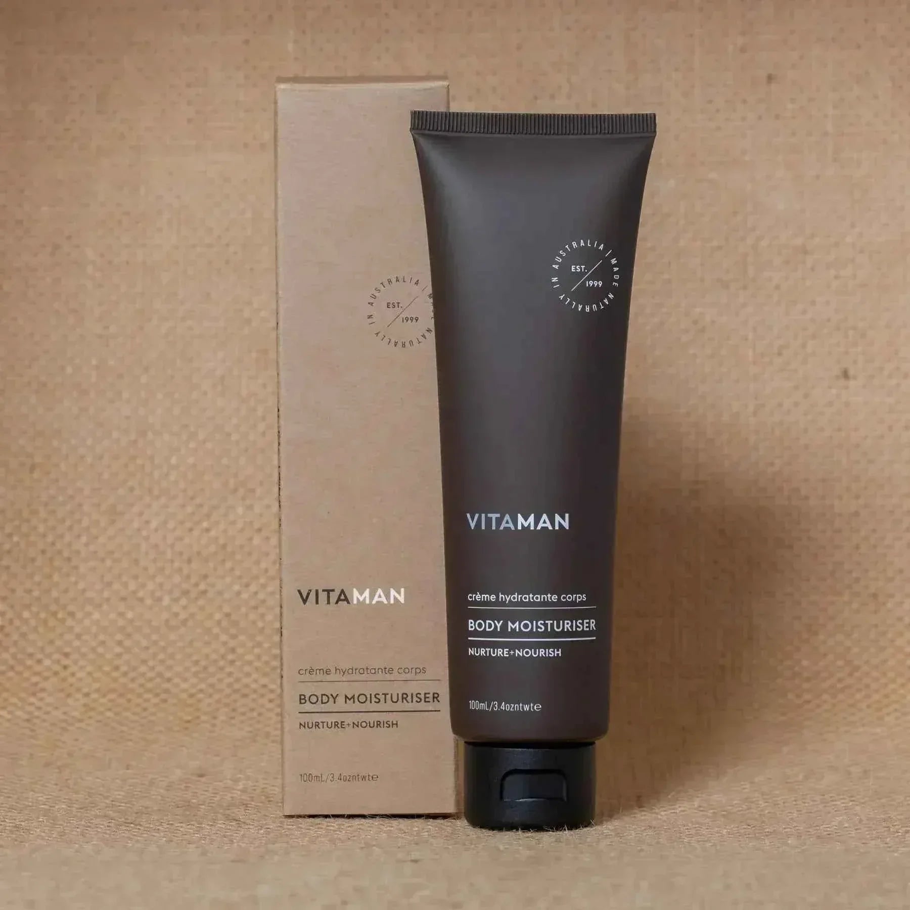 VITAMAN Australia body moisturizer in a white tube, showing smooth skin and hydration for healthy, nourished skin.