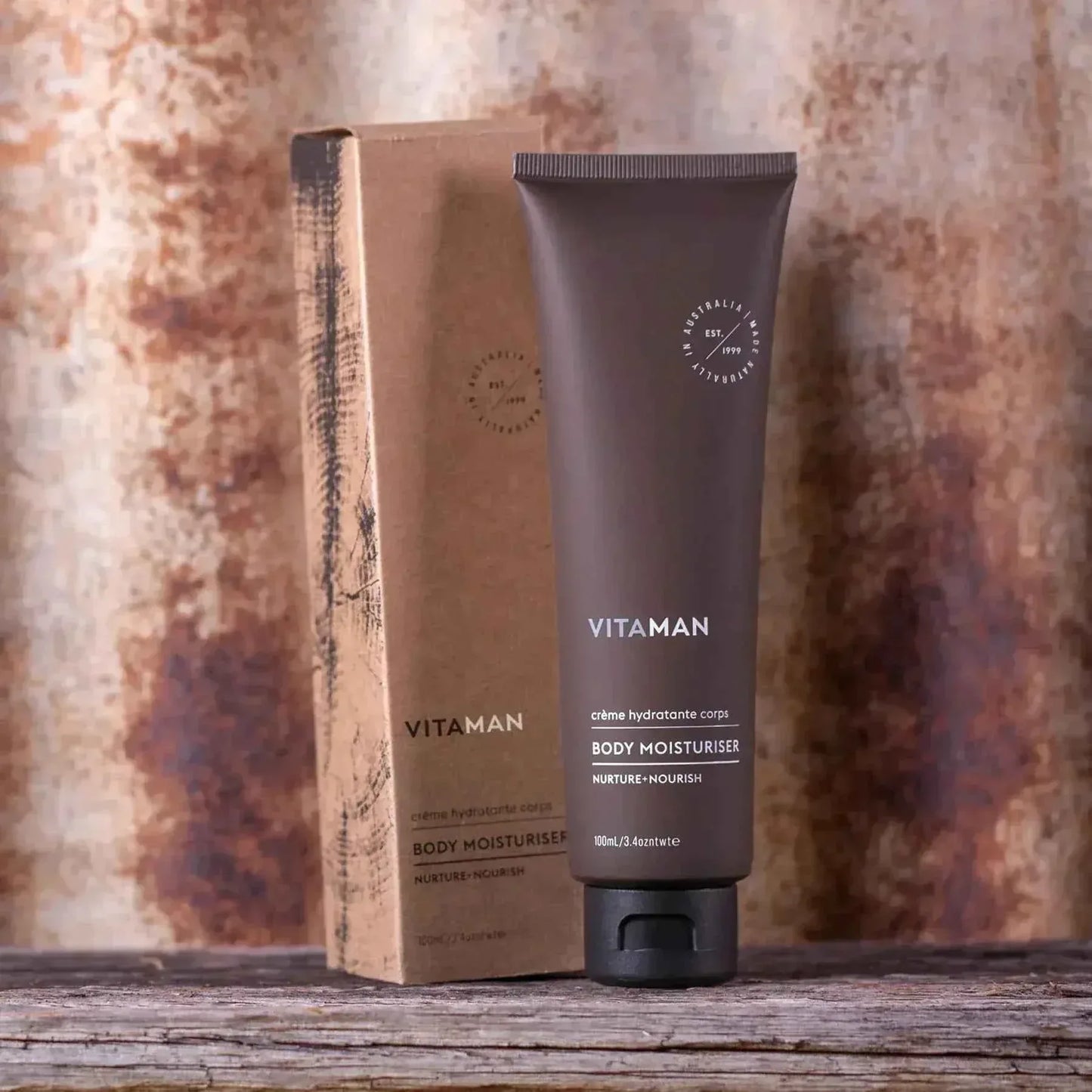 VITAMAN Australia body moisturizer applied to skin, highlighting smooth and hydrated body skin in a natural setting.