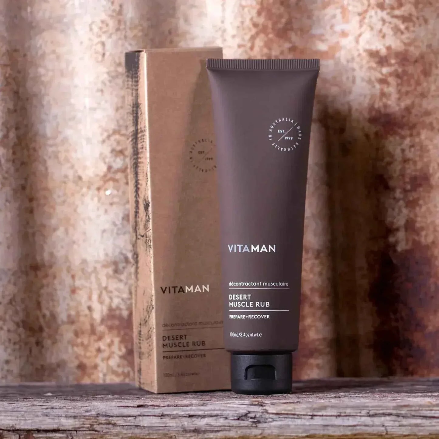VITAMAN Australia Desert Muscle Rub for Men, a body grooming product shown in a sleek container, designed to soothe and revitalize muscles.