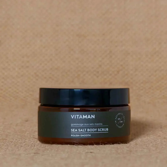 VITAMAN Australia Sea Salt Body Scrub in a jar, showing the textured salt exfoliant for smooth skin.