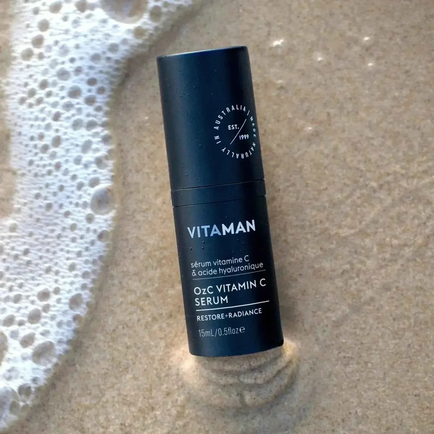 VITAMAN Australia OzC Vitamin C Serum 15ml for face, clear bottle with dropper, promoting bright, healthy skin.