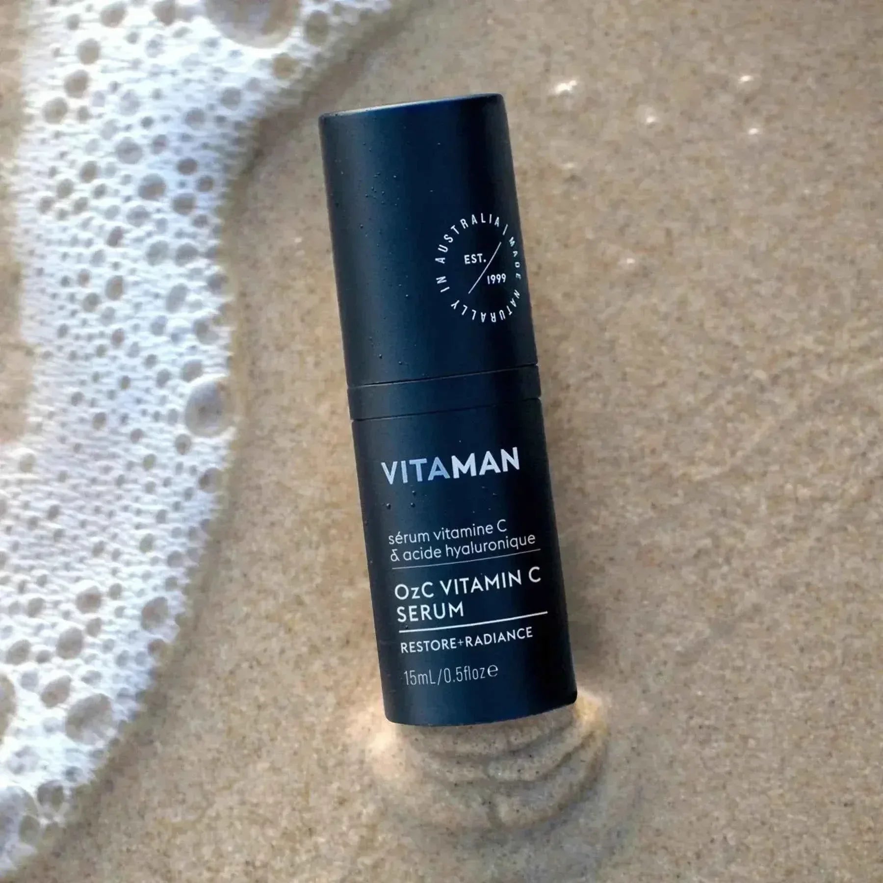VITAMAN Australia OzC Vitamin C Serum 15ml for face, clear bottle with dropper, promoting bright, healthy skin.