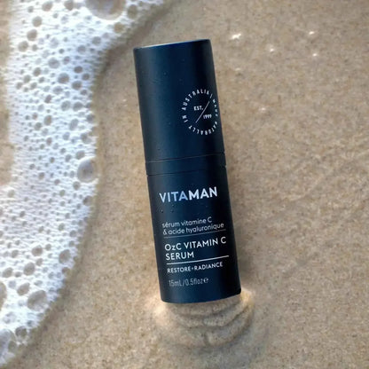 VITAMAN Australia OzC Vitamin C Serum 15ml for face, clear bottle with dropper, promoting bright, healthy skin.