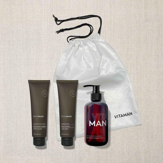VITAMAN Australia men's skincare essentials gift set with cleanser, moisturizer, and grooming products on white background.