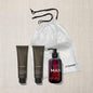 VITAMAN Australia men's skincare essentials gift set with cleanser, moisturizer, and grooming products on white background.