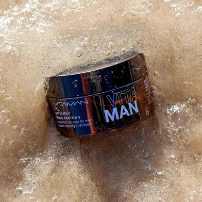 VITAMAN Australia men's medium hold hair gel in 100g container, designed for essential skin and hair care.