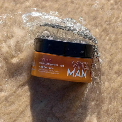 VITAMAN Australia Matt Mud Max Hold 100g hair styling clay with strong hold, showcasing the product container and textured clay.