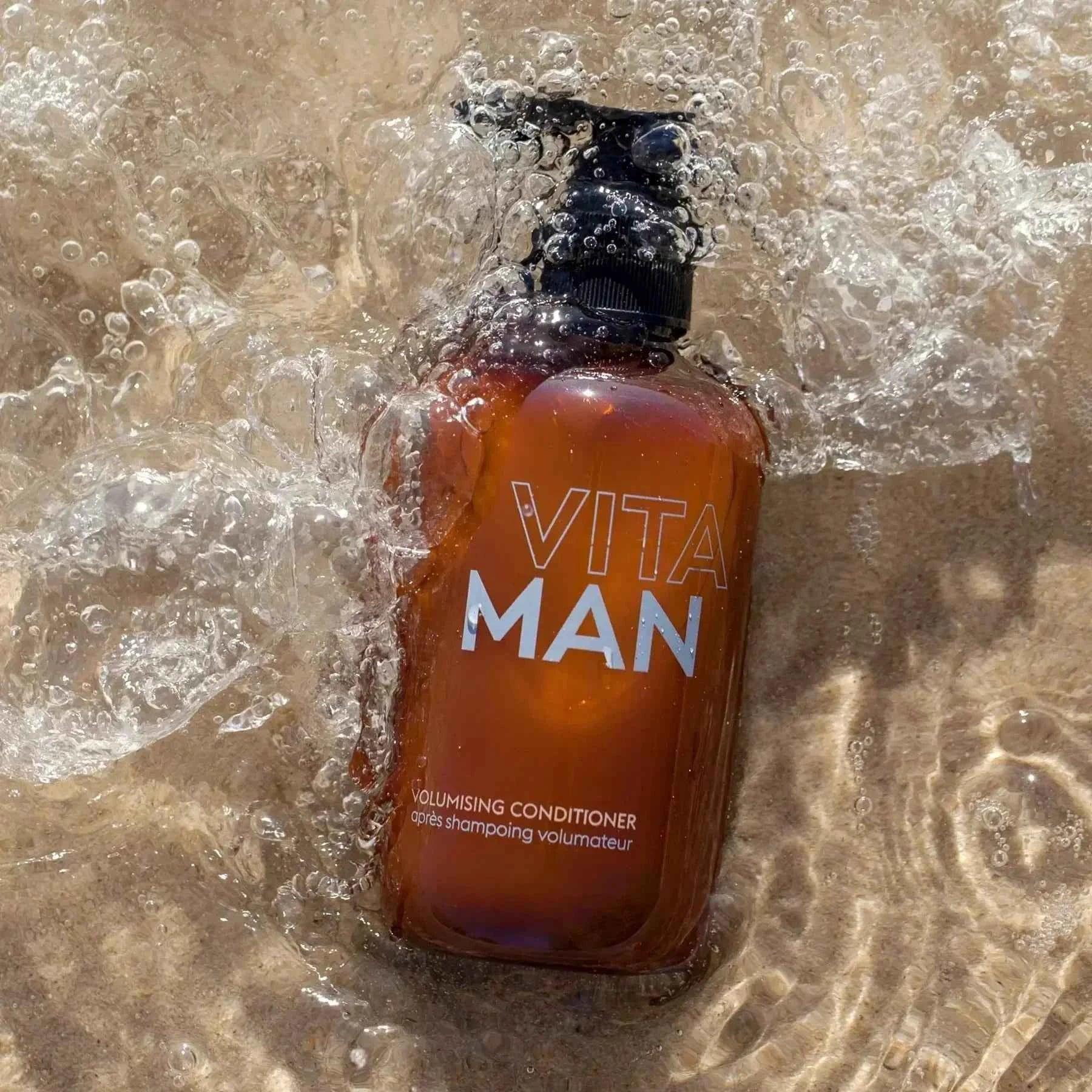 VITAMAN Australia volumising hair conditioner bottle, 250ml, with sleek packaging and product label visible.